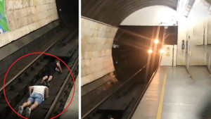 Clip: 2 thiếu niên liều chết nằm dưới đường ray cho tàu chạy qua