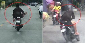 Clip: Quái xế lái xe máy bằng chân, múa may loạn xạ như làm xiếc trên phố