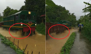 Clip: Đường ray ngập nước, dân Yên Bái thích thú xem tàu hỏa hóa... tàu thủy