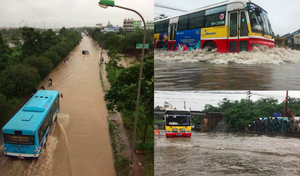 Mưa lớn ngày cuối tuần, xe buýt 'bơi' giữa phố Hà Nội