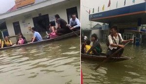 Clip: Ngập gần 2m, dân nô nức đi thuyền, bè trên quốc lộ 6