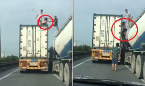 Clip: Cô gái mặc váy ngắn tái xuất, nhảy múa trên nóc container ở cầu Thanh Trì