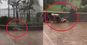 Clip: Kinh hoàng gió thổi bay 2 bố con trong bão MANGKHUT