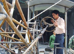 Kiếm tiền tỷ nhờ sáng chế băng chuyền tự xúc cát sỏi