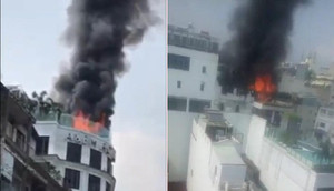 Clip: Cháy lớn trên tầng thượng khách sạn ở TP. HCM