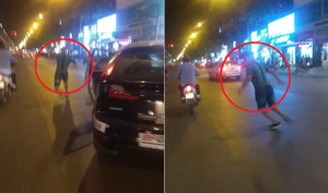 Clip: Va chạm giao thông, tài xế ô tô cầm đá ném taxi như phim hành động