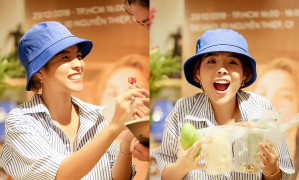 Fan mang bánh tráng trộn tặng Vũ Cát Tường trong buổi ký tặng