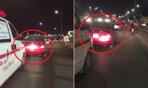 Clip ô tô con chắn đường xe cứu thương trên cầu vượt gây tranh cãi