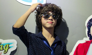 Con trai nuôi của Isaac tự tin khi lần đầu làm MC ở tuổi 14