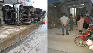 Vào cua gấp, xe container lật nghiêng đổ vào nhà dân ở Điện Biên