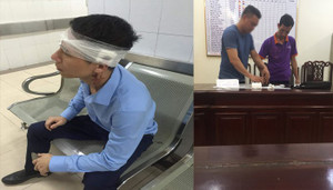 Va chạm khi xi nhan ở Hà Nội, tài xế taxi hành hung lái xe bán tải