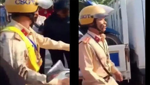 Bị nhắc nhở đi gọn vào lề đường, đám người tham gia lễ hội quết bùn vào mặt CSGT