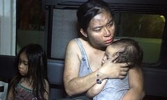 Ký ức người mẹ ôm 2 con chạy trong vụ cháy Carina 1 năm trước