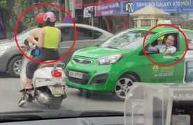 Clip: Dừng đèn đỏ nghênh ngang còn đôi co với tài xế taxi, 2 cô gái lĩnh trái đắng