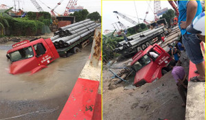 Clip: 'Hố tử thần' nuốt chửng đầu xe container ở Hà Nội