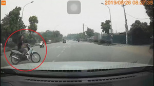 Clip: Sang đường kiểu 'tự sát', cô gái trẻ bị tông bay lên nắp capo