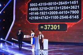 Video: Kinh ngạc cậu bé khai căn dãy 63 số trong 11 giây