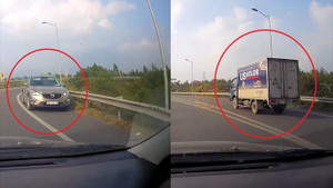 Clip: Ô tô và xe tải thay nhau đi lùi, chạy ngược chiều trên cao tốc