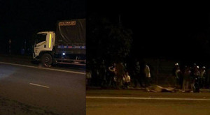 Va vào xe máy ngược chiều ngã xuống đường, 2 người bị xe tải cán chết