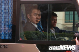 Ảnh: Đoàn xe chở nhân viên an ninh Triều Tiên về khách sạn Melia ở Hà Nội