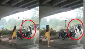 Gã chồng vác dao truy sát vợ trên phố Hà Nội khai gì?