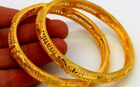 Vàng bứt phá tăng mạnh bất chấp đồng USD treo cao