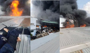 Cháy dữ dội gần 3 tiếng, thiêu rụi hàng nghìn mét vuông nhà xưởng ở TP.HCM