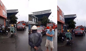 Bảng quảng cáo đè sập nhà dân, 2 người thương vong