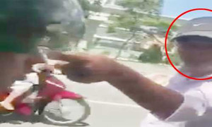 Xe ôm doạ rút dao đâm chết tài xế GrabBike vì 'tranh giành khách'