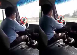 Đuổi việc tài xế vừa lái xe buýt vừa lướt điện thoại trên quốc lộ