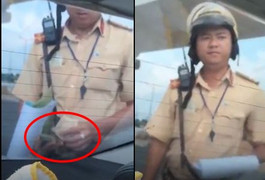 Video: Chiến sĩ CSGT ở TP.HCM nghi nhận xấp giấy giống tiền