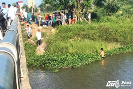 Mẹ bầu ôm 2 con nhỏ nhảy cầu tự tử ở Nghệ An