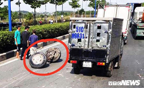 Xe tải đang chạy bỗng rơi 2 bánh trước, tài xế may mắn thoát chết