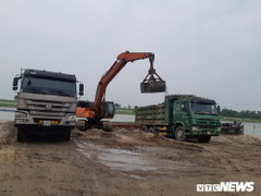 Bãi tập kết vật liệu xây dựng không phép hoạt động rầm rộ 'thách thức' cơ quan chức năng Bắc Ninh