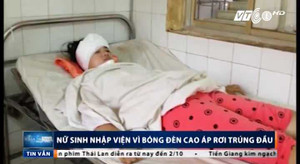 Nữ sinh đi trên đường bị đèn cao áp rơi trúng đầu