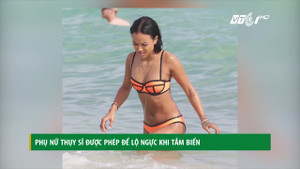 Phụ nữ Thụy Sĩ đua nhau để ngực trần tắm biển