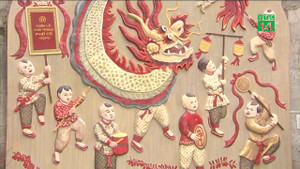 'Trẻ em mặc hàng hiệu' trong tranh dân gian trên phố Hà Nội gây tranh cãi