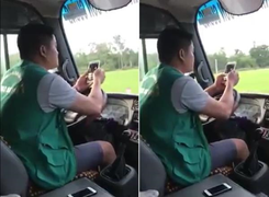 Tài xế xe buýt vừa xem điện thoại vừa lái xe bằng khuỷu tay bị xử lý thế nào?