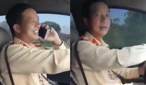 Xác minh clip Thiếu tá CSGT vừa lái xe vừa nghe điện thoại, không thắt dây an toàn