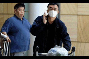 Virus corona mới có thể lây từ người sang người trong 15 phút tiếp xúc