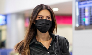 Minh Tú đeo khẩu trang kín mít, lên đường sang Mỹ dự tuần lễ thời trang