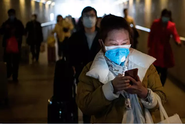 Người Trung Quốc ôm nỗi lo lây nhiễm virus corona trở lại làm việc