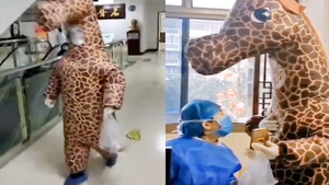 Clip: Hết khẩu trang, người phụ nữ diện trang phục hươu cao cổ tránh Covid-19