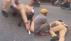 Cận cảnh nam thanh niên chở bạn gái tông trúng CSGT ở Hà Nội