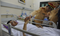 Sức khỏe Trung úy CSGT bị đôi nam nữ đi xe máy vượt đèn đỏ tông gục giờ ra sao?