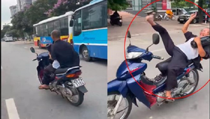 Video: Quái xế U50 đi xe máy thả hai tay, lạng lách giữa đường