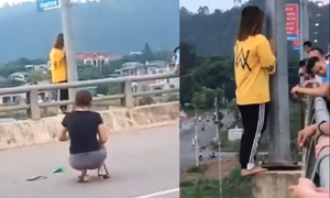 Giải cứu cô gái trẻ định nhảy cầu tự tử ở Lào Cai