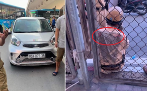 Ô tô vượt đèn đỏ kéo lê chiến sĩ CSGT hàng chục mét trên phố