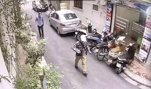 Hai kẻ cướp ngân hàng BIDV rải 52 tờ 100.000 nghìn trên đường tẩu thoát