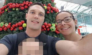 Chồng đấm vào đầu cá mập để giải cứu vợ